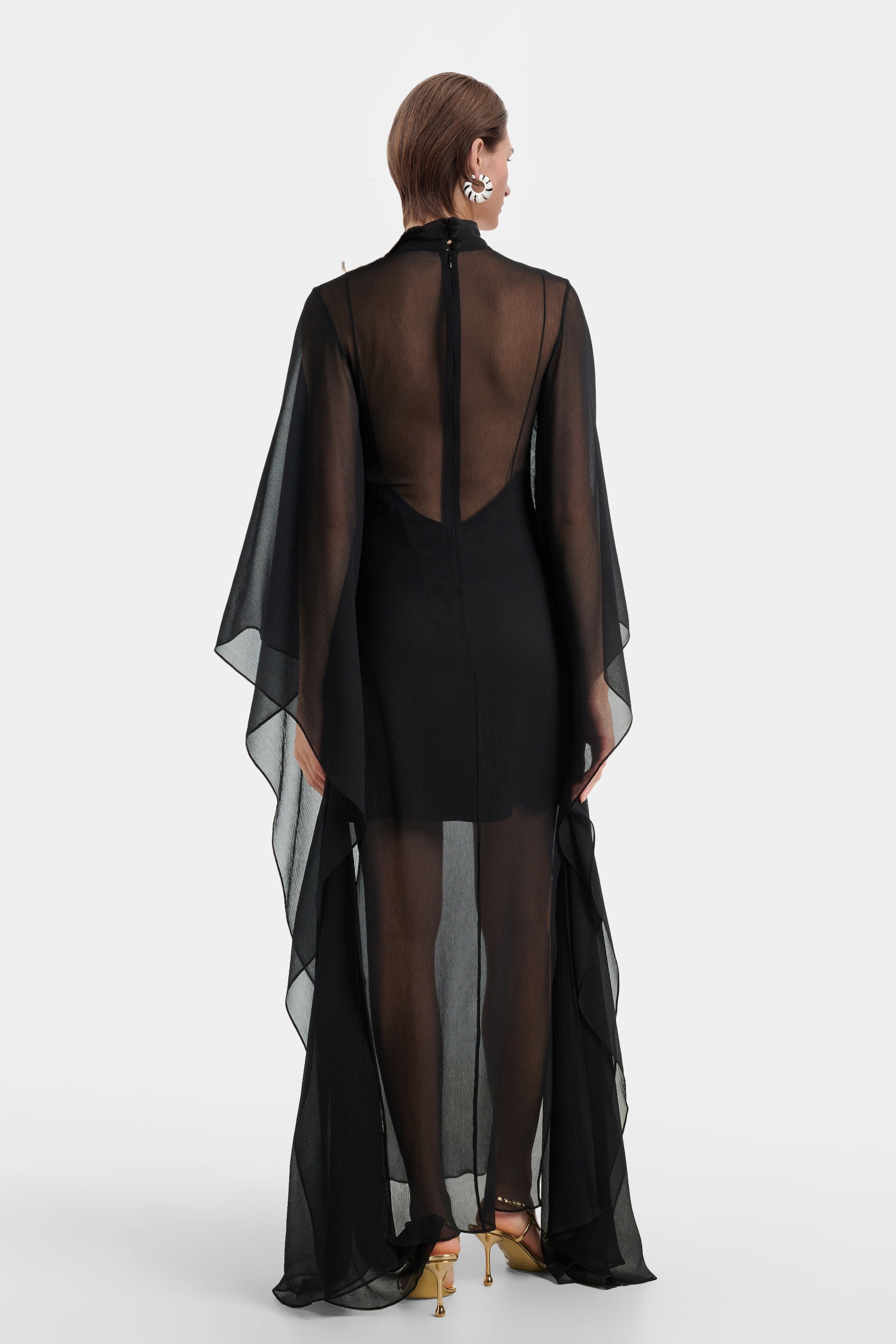 Side view of black Sheer Black Silk Chiffon Overlay Gown showing the silhouette