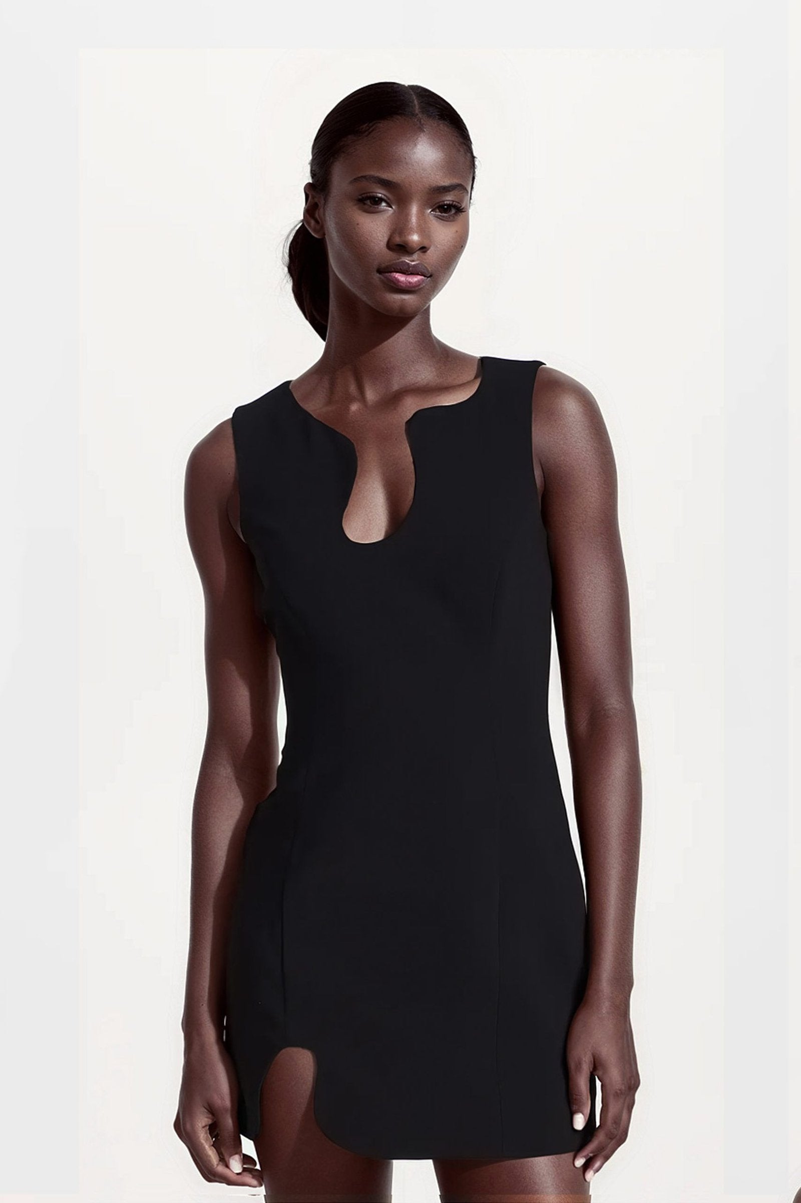 Asymmetric black mini dresses with a unique puzzle-inspired design