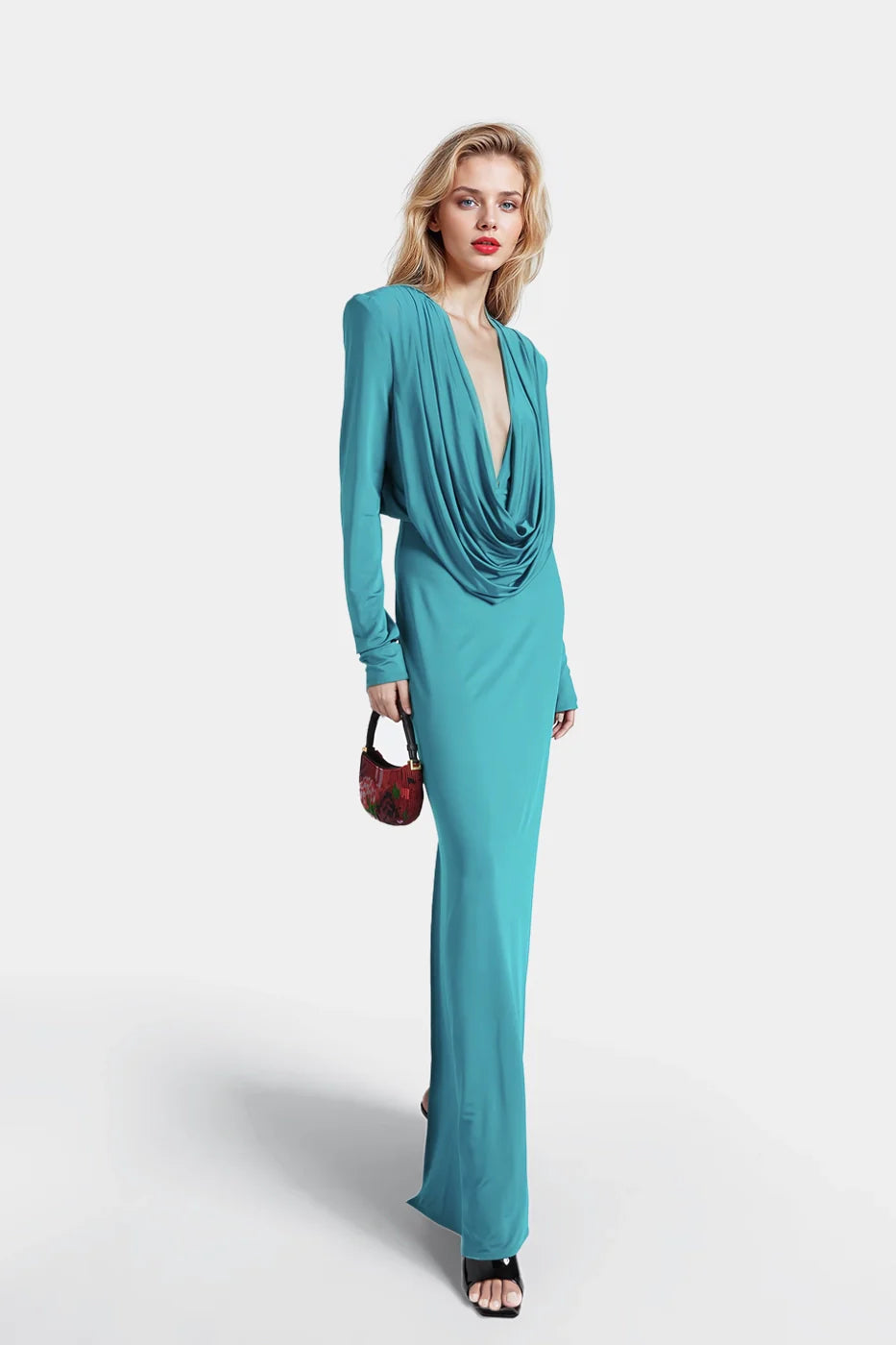 Long green jersey dresses featuring a cascading pleat neckline.