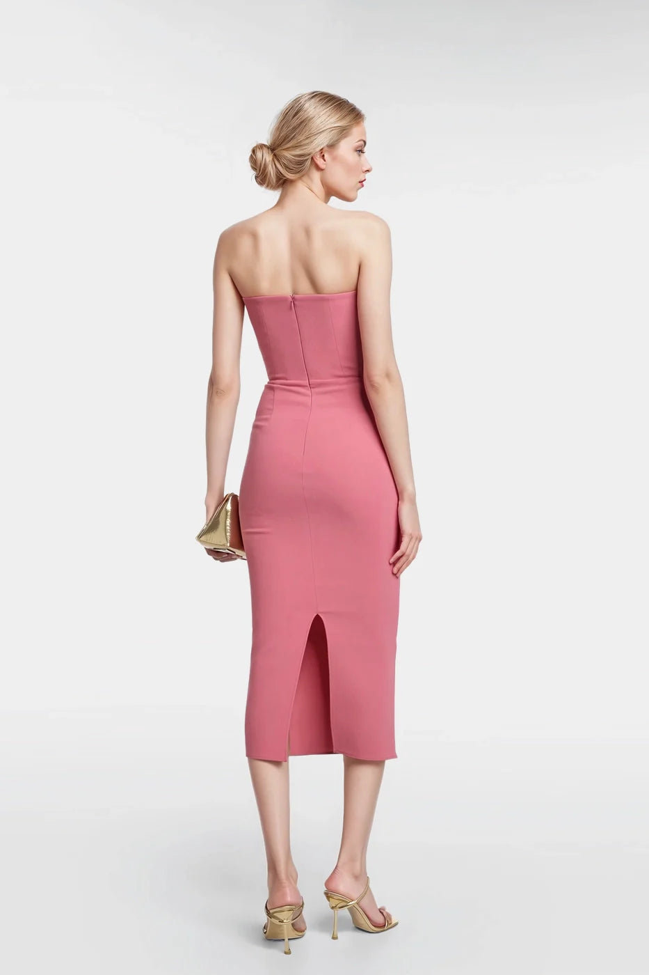"Flowing pink midi dresses with a back slit for graceful movement."