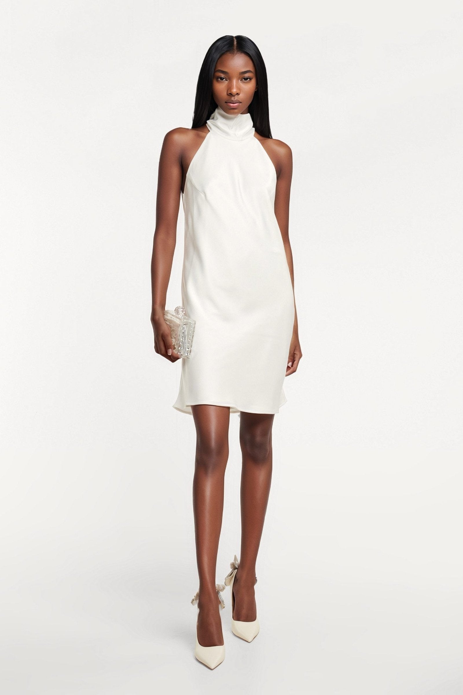 Chic halterneck dresses featuring a fluted hem, perfect for any bridal occasion.
