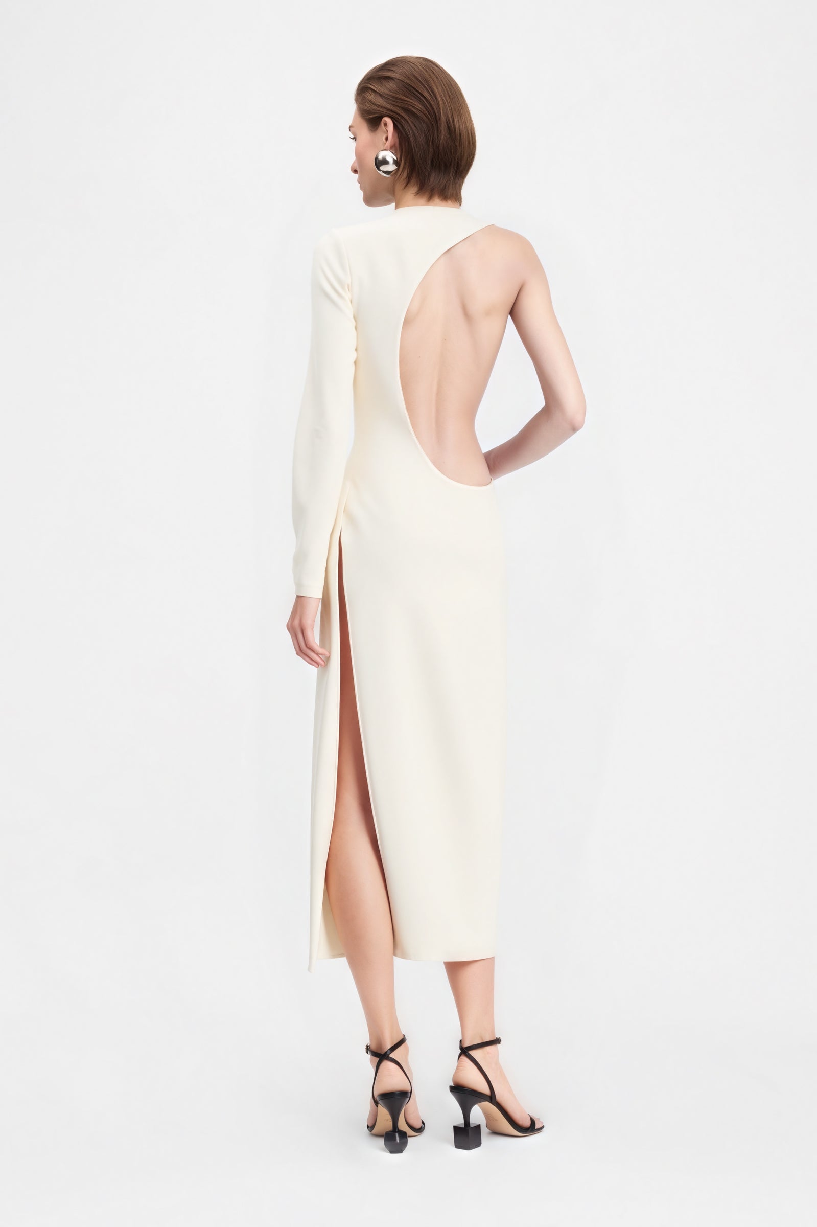 Elegant one-sleeve off-white midi dress for evening events
