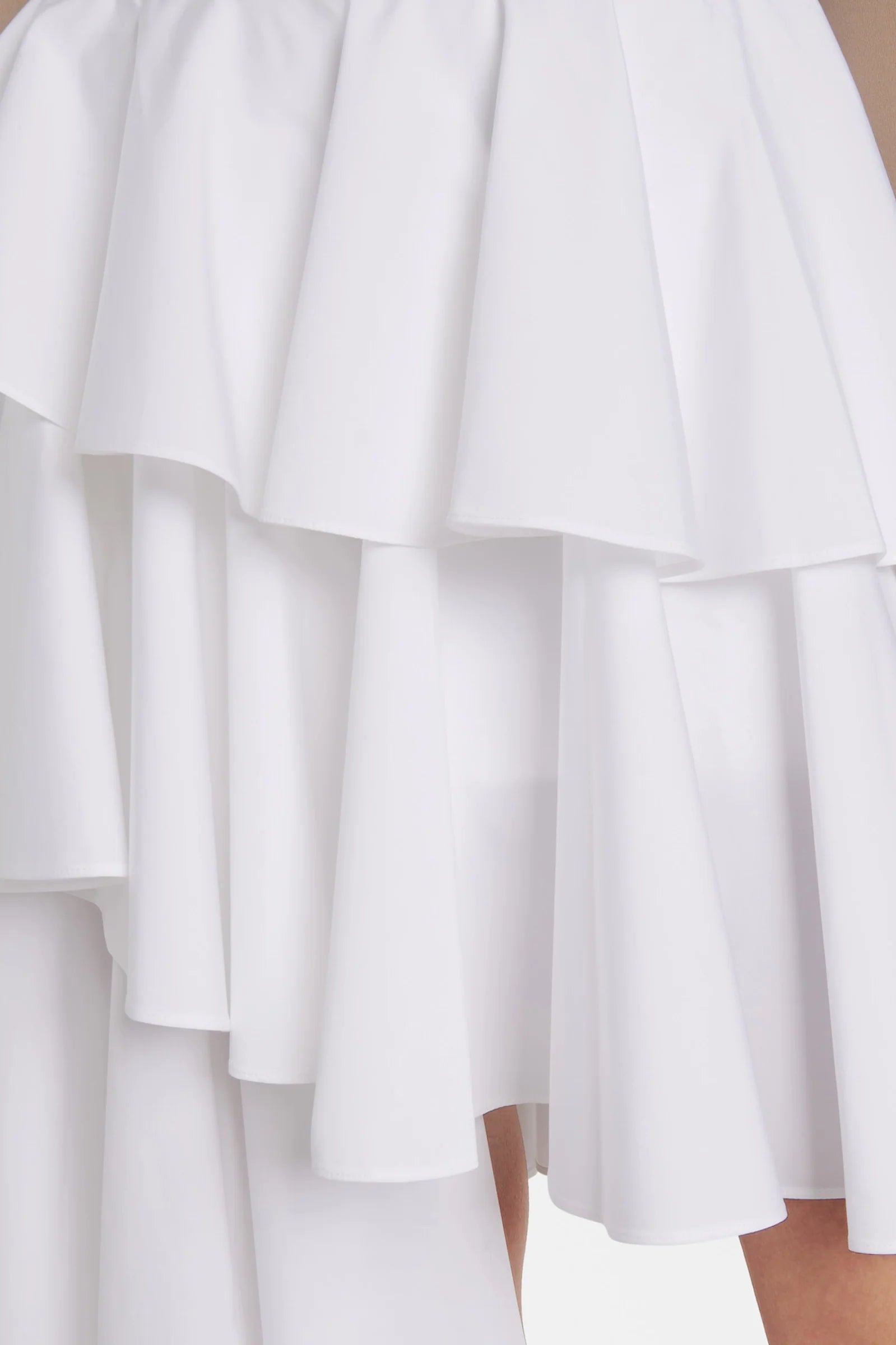 Back view highlighting clean waistband and concealed side zip