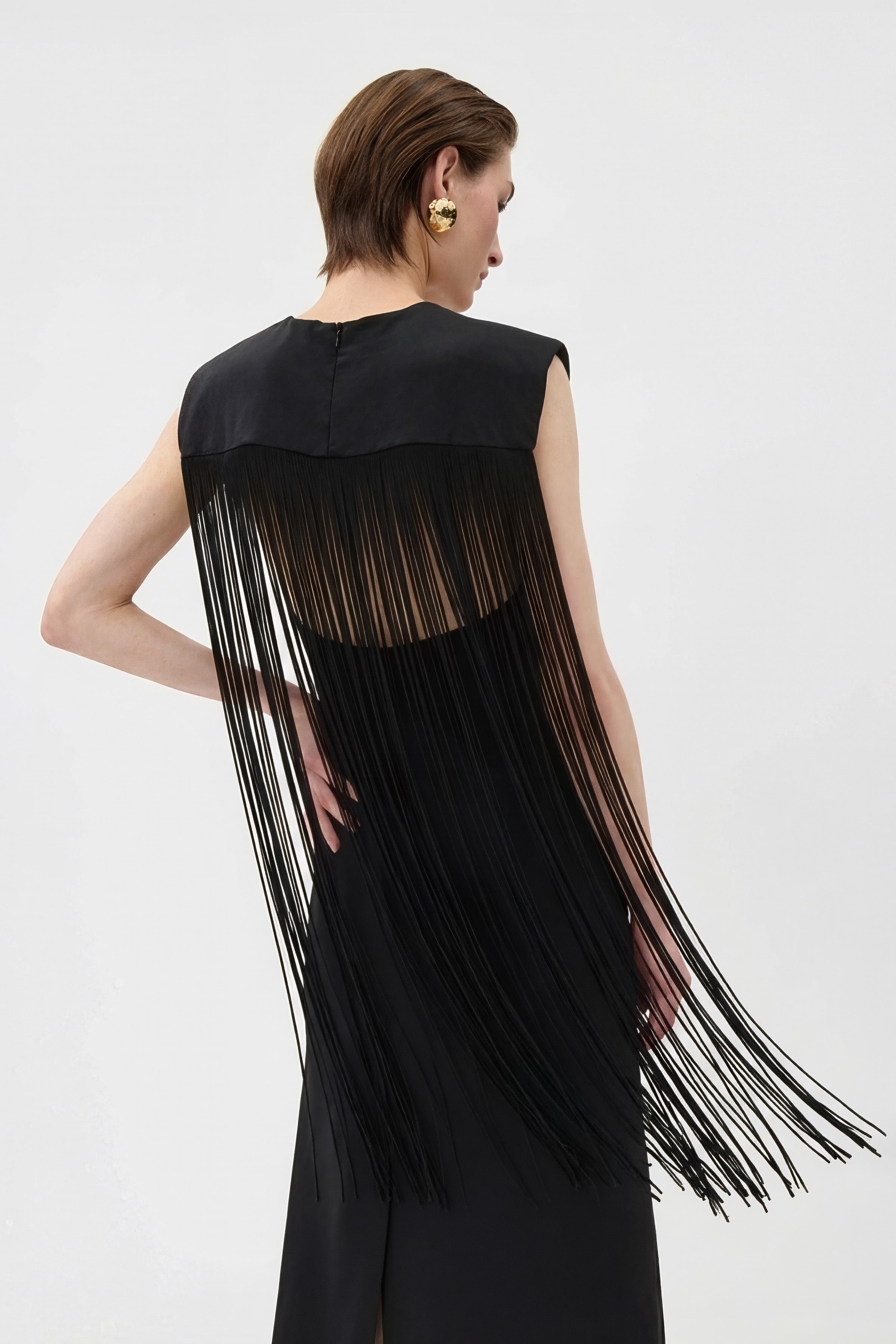 Stylish fringed dresses designed for women, perfect for evening events and special occasions.