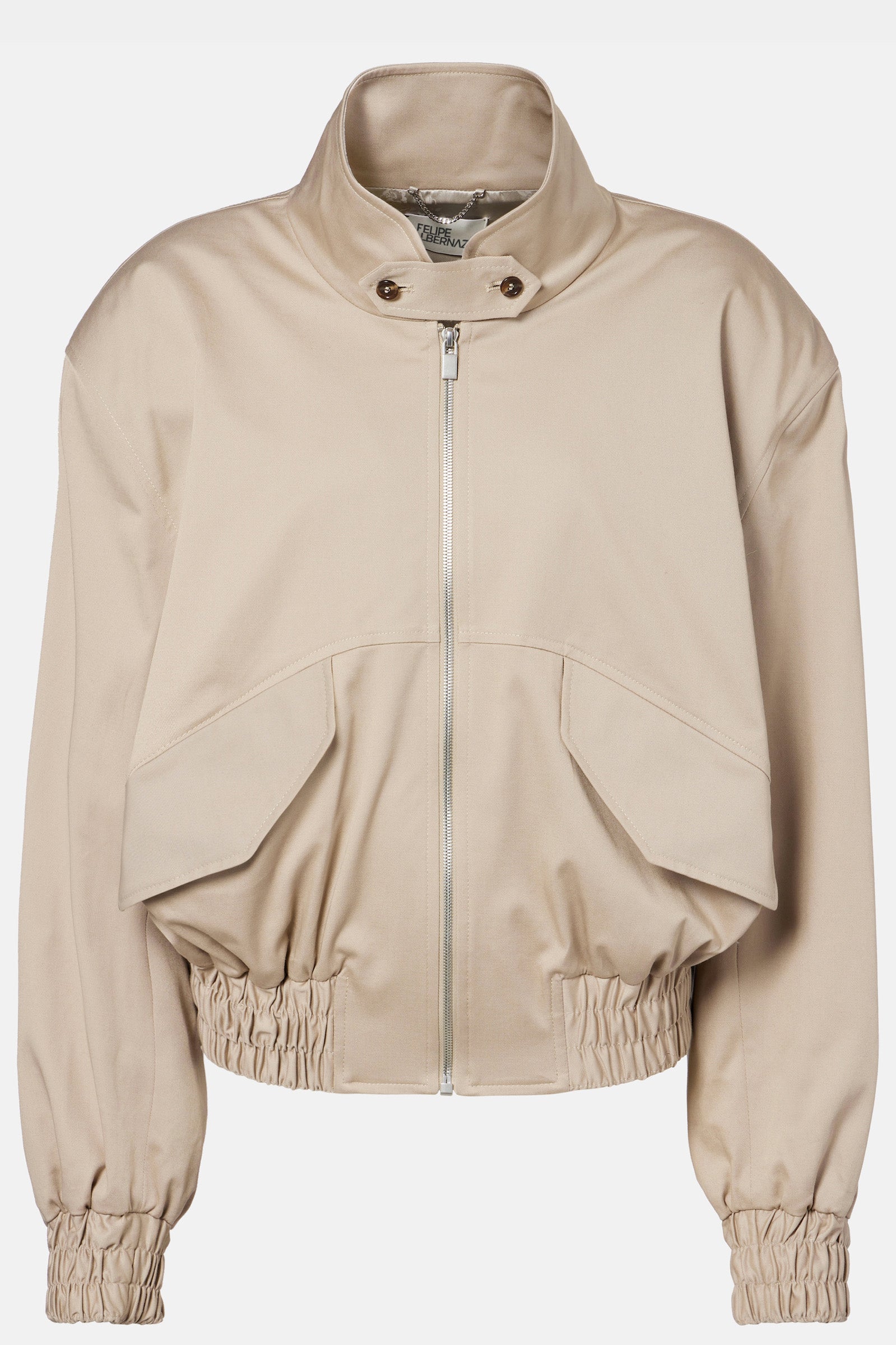 Full view of oversized beige bomber jacket with high collar