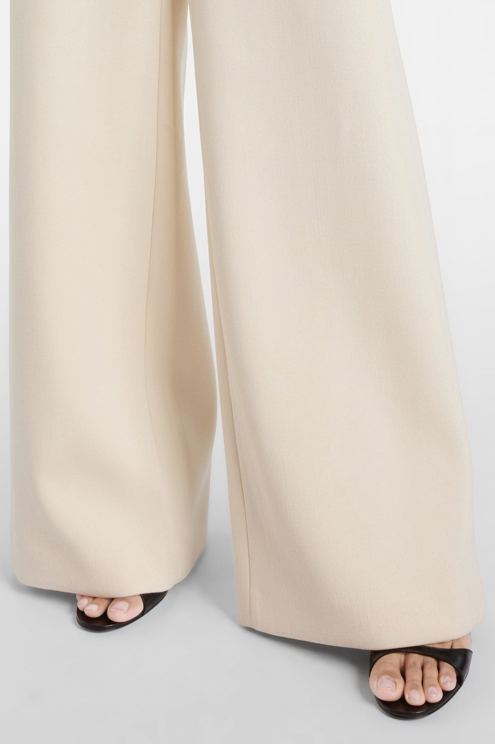 Detail of cream crepe jumpsuit