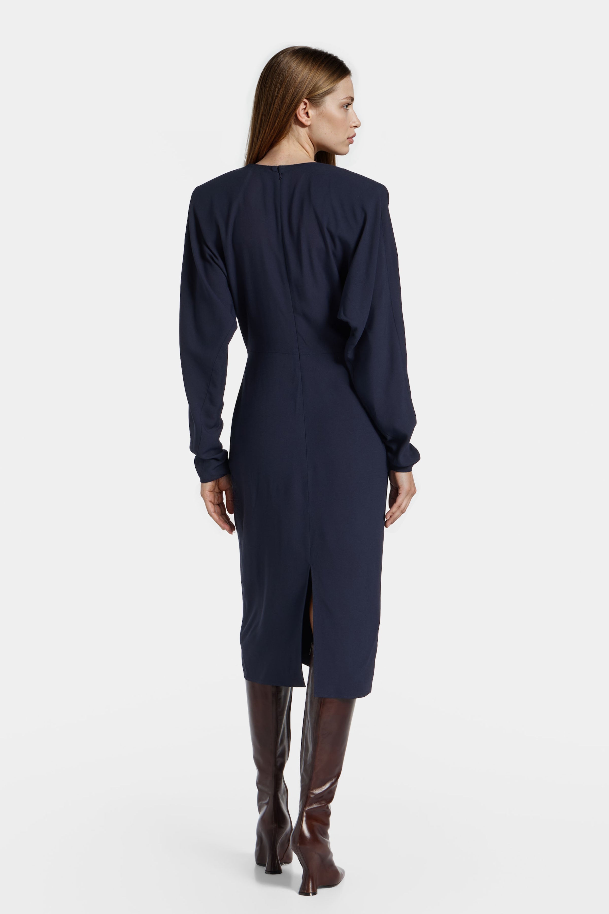 Back view of Felipe Albernaz Nok Navy Dress – clean lines and tailored midi length