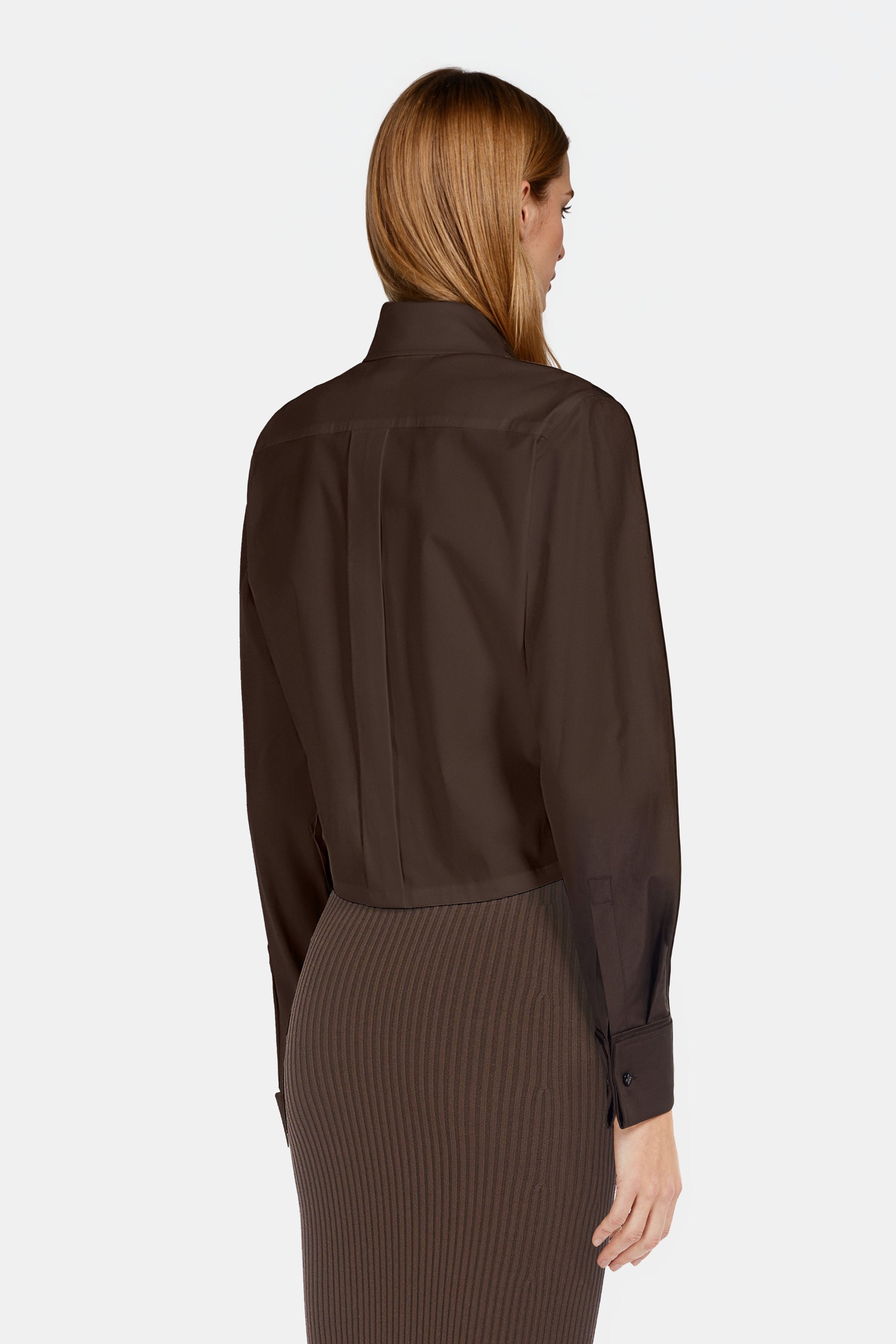 Back view of cropped brown shirt – long sleeve design with structured cotton poplin fabric