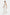 Model in silk halter gown, side view in motion, smooth and elegant drape.
