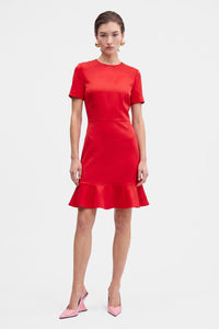 Scarlet flounce hem dress, short sleeves, model wearing, front view, pink heels.