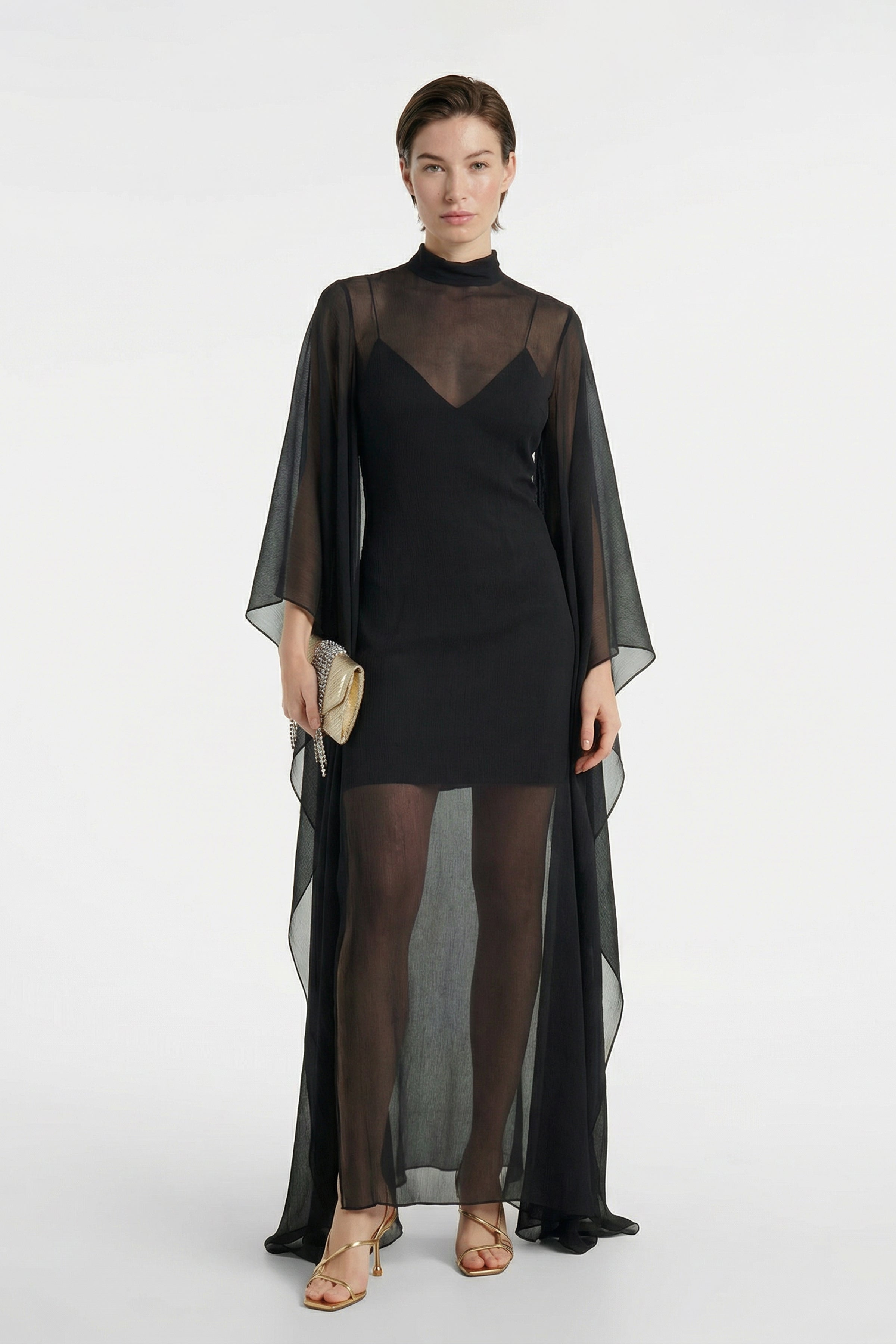 Black column gown with sheer chiffon overlay, front view