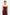Burgundy strapless slit gown, close-up front view, model wearing silver earrings.