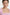 Close-up of Blush Elegance Midi Dress neckline, model wearing drop earrings.