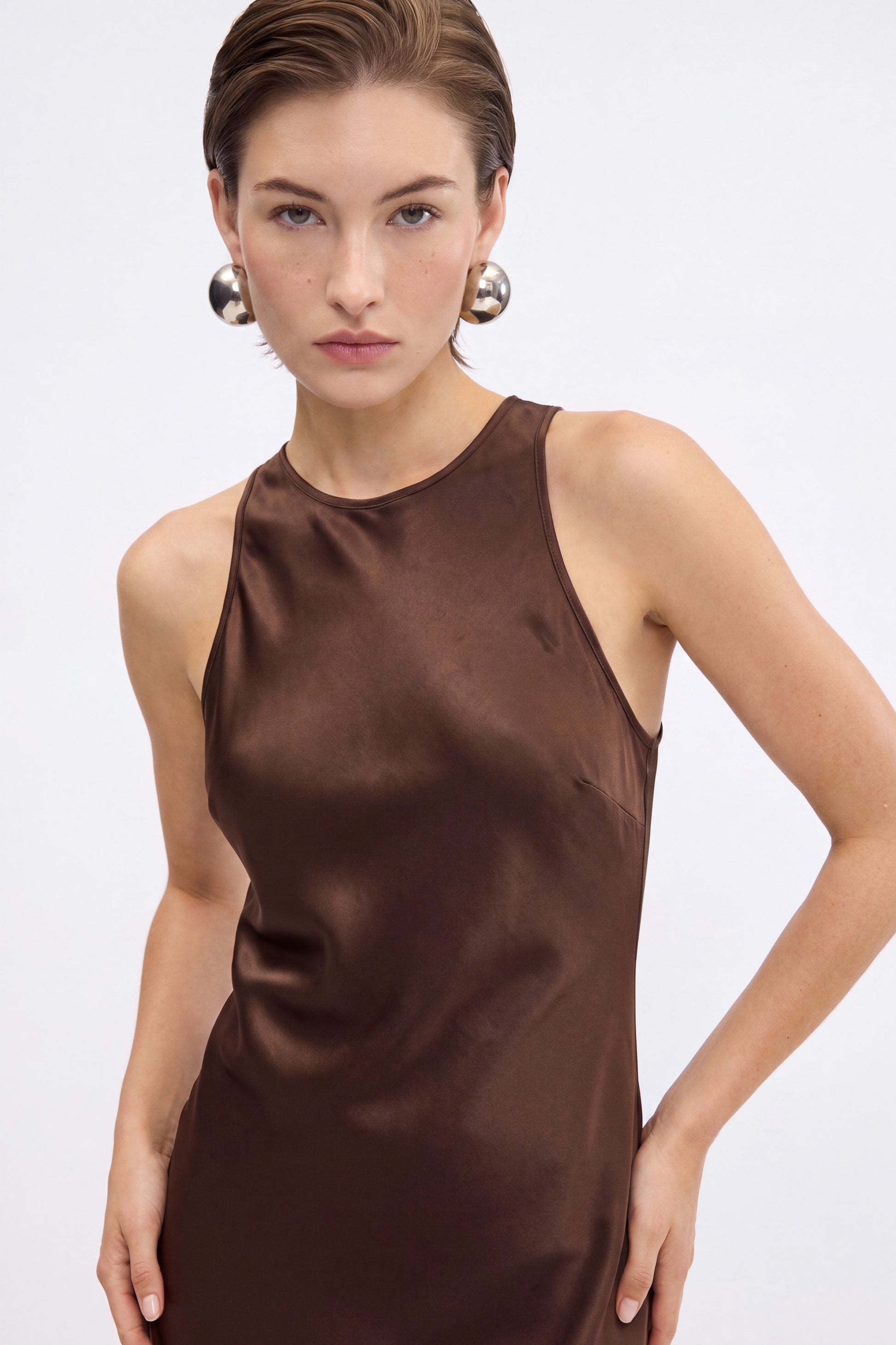 Front view of a Chocolate Satin Midi Dress on a model with short hair.