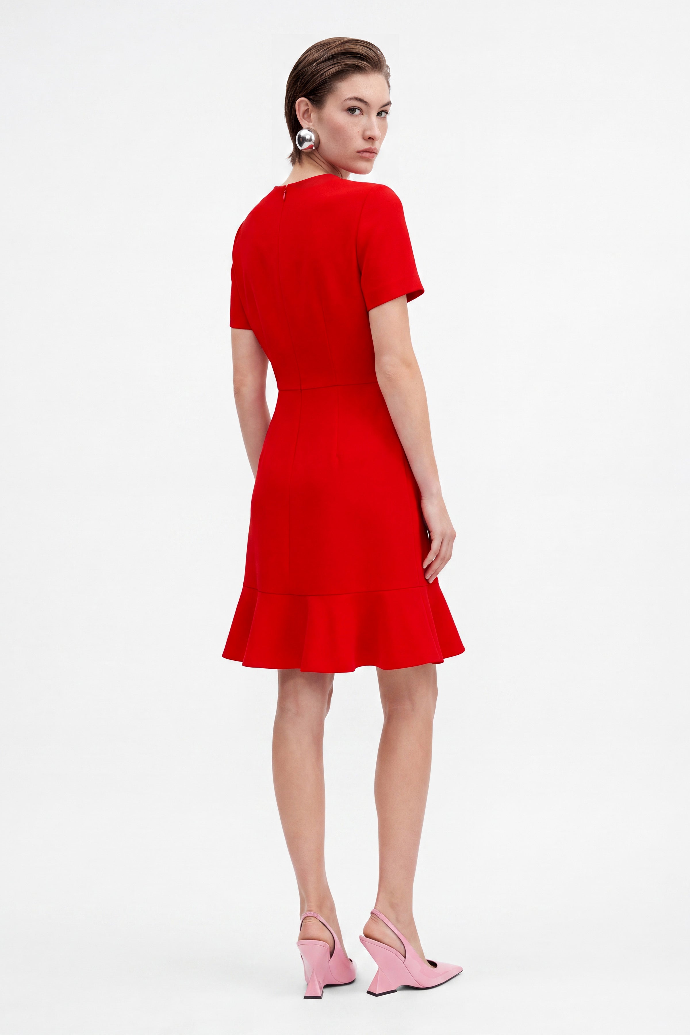 Back view of Scarlet Flounce Hem Dress, model in pink heels.