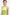 Model wearing a lime-green asymmetric halter dress with metallic earrings, front view.