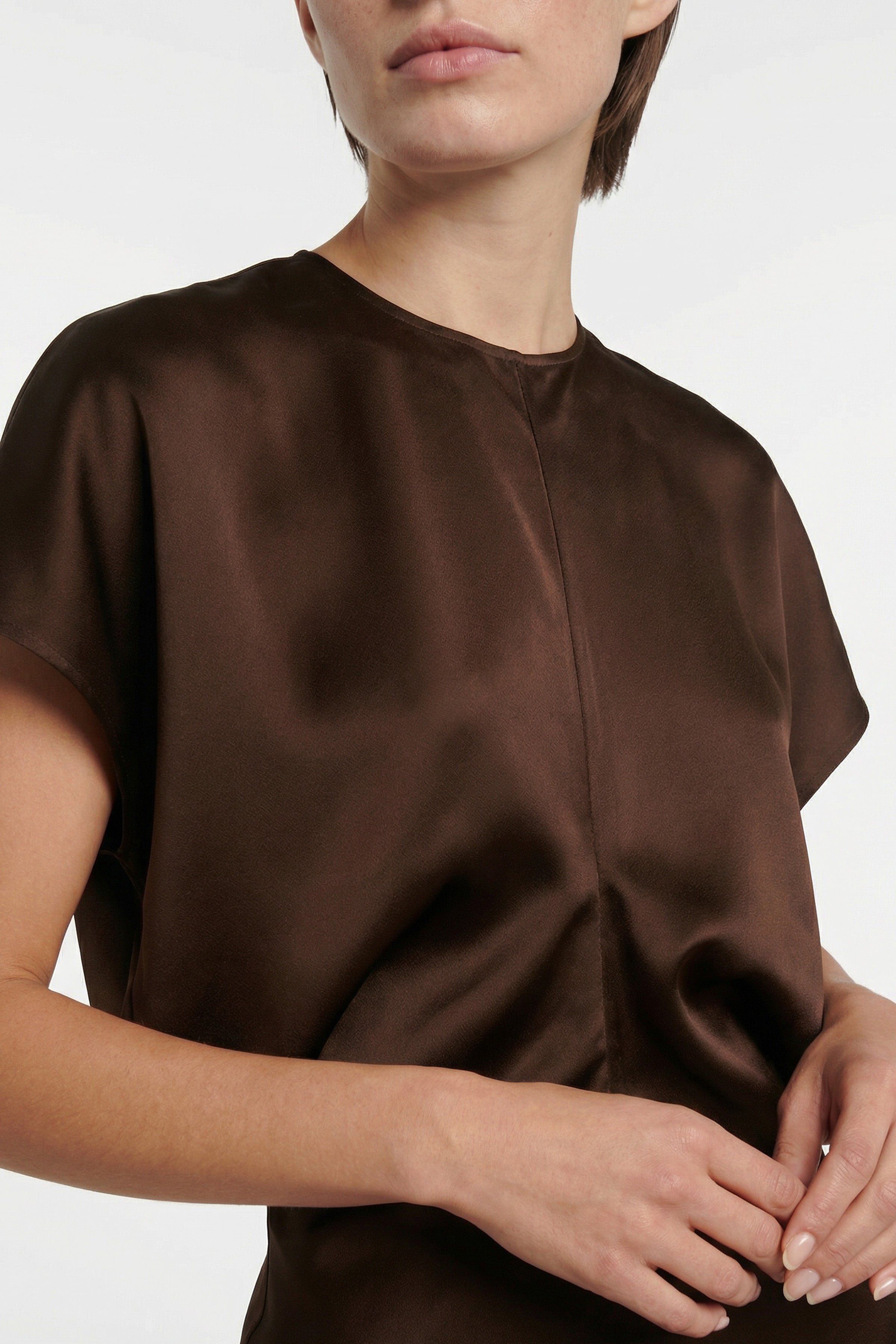 Front view, chocolate satin maxi dress detail, short sleeves, smooth fabric finish.