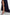 Navy ruffle hem gown detail, silver heels, model's legs, elegant evening look.