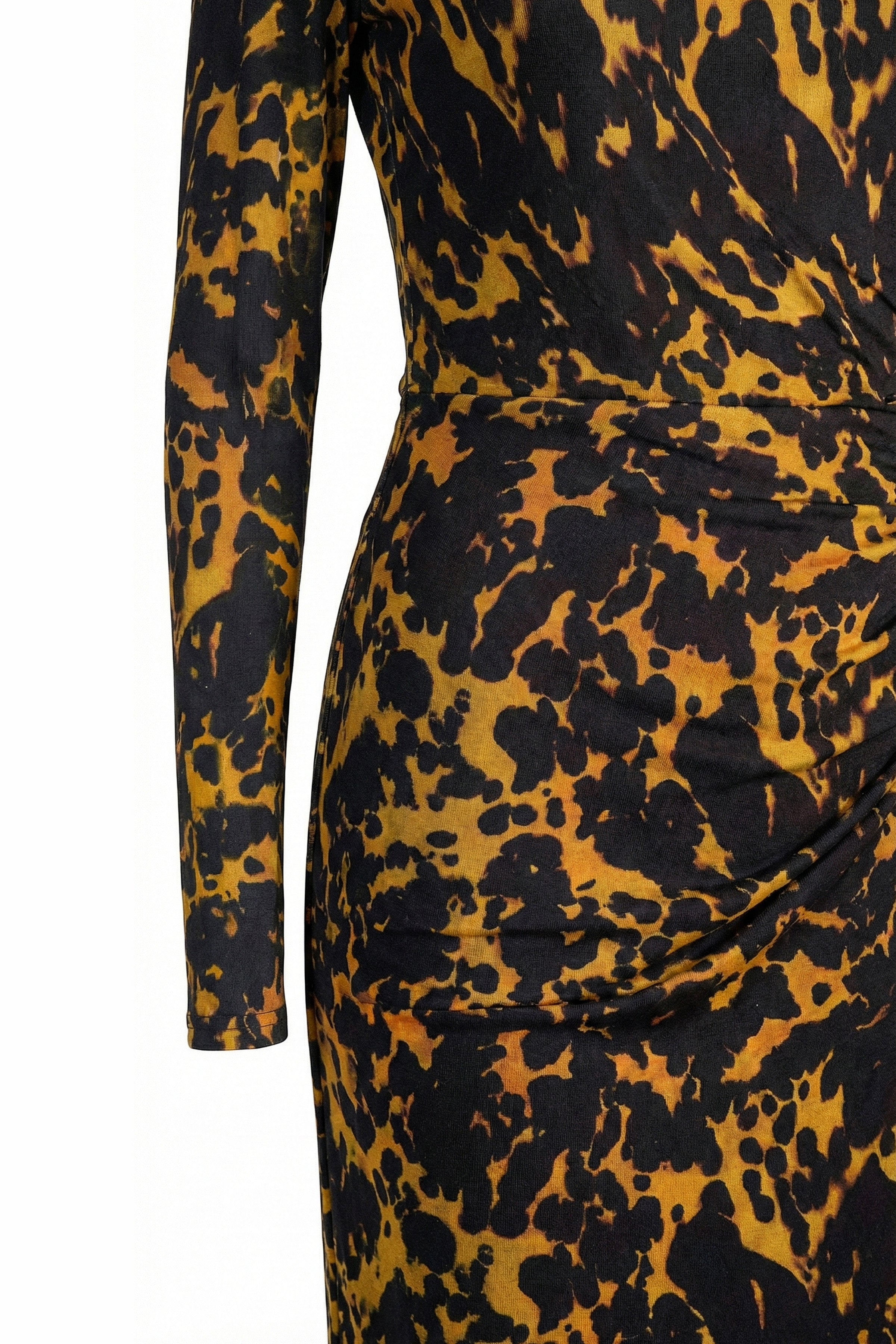 Close-up detail of high-quality animal print fabric texture and ruched side detailing on a designer long-sleeve midi dress.