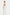 Model wearing elegant white silk halter gown, back view, flowy design, long tie detail.