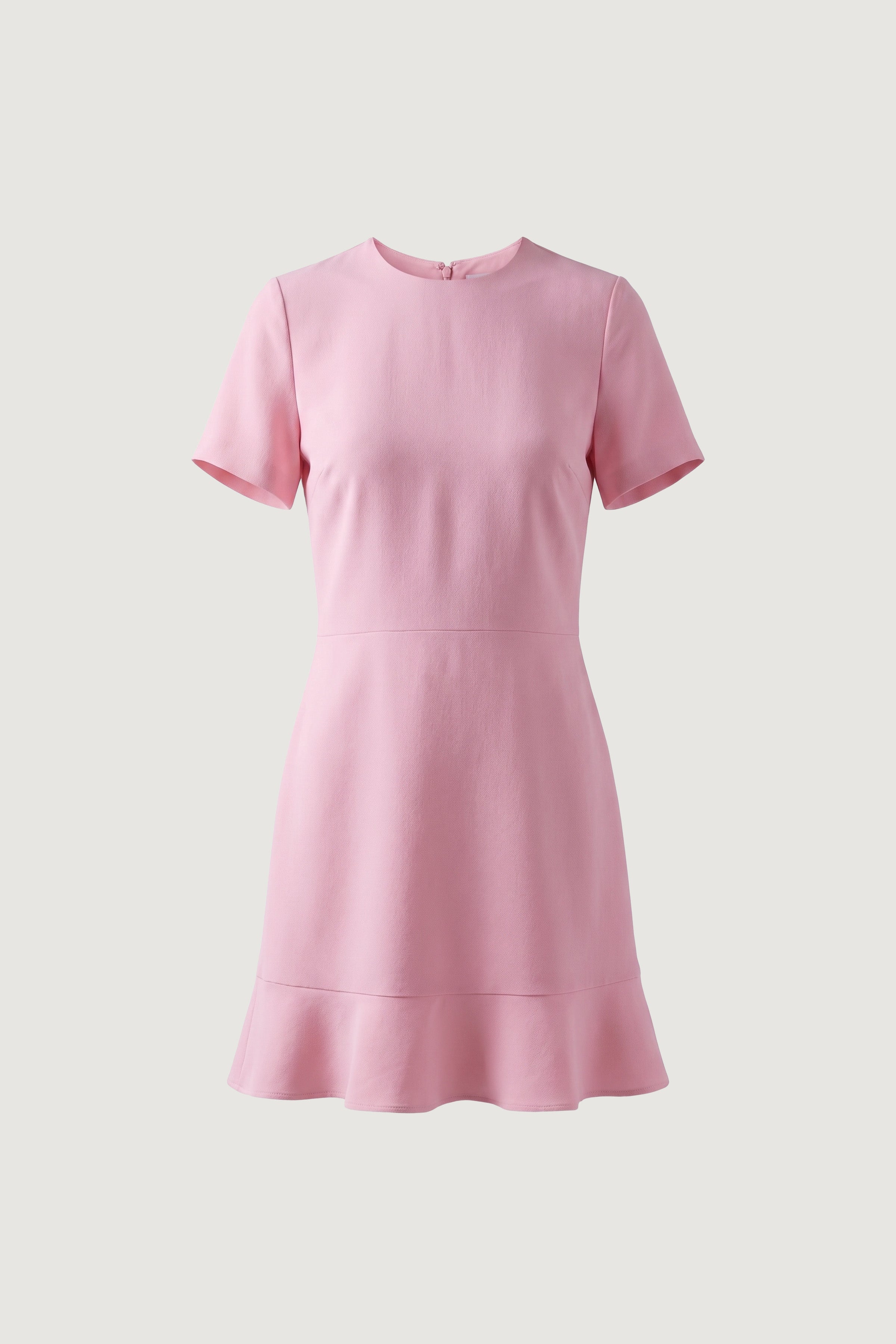 Front view of pink flounce hem dress with short sleeves and simple neckline.
