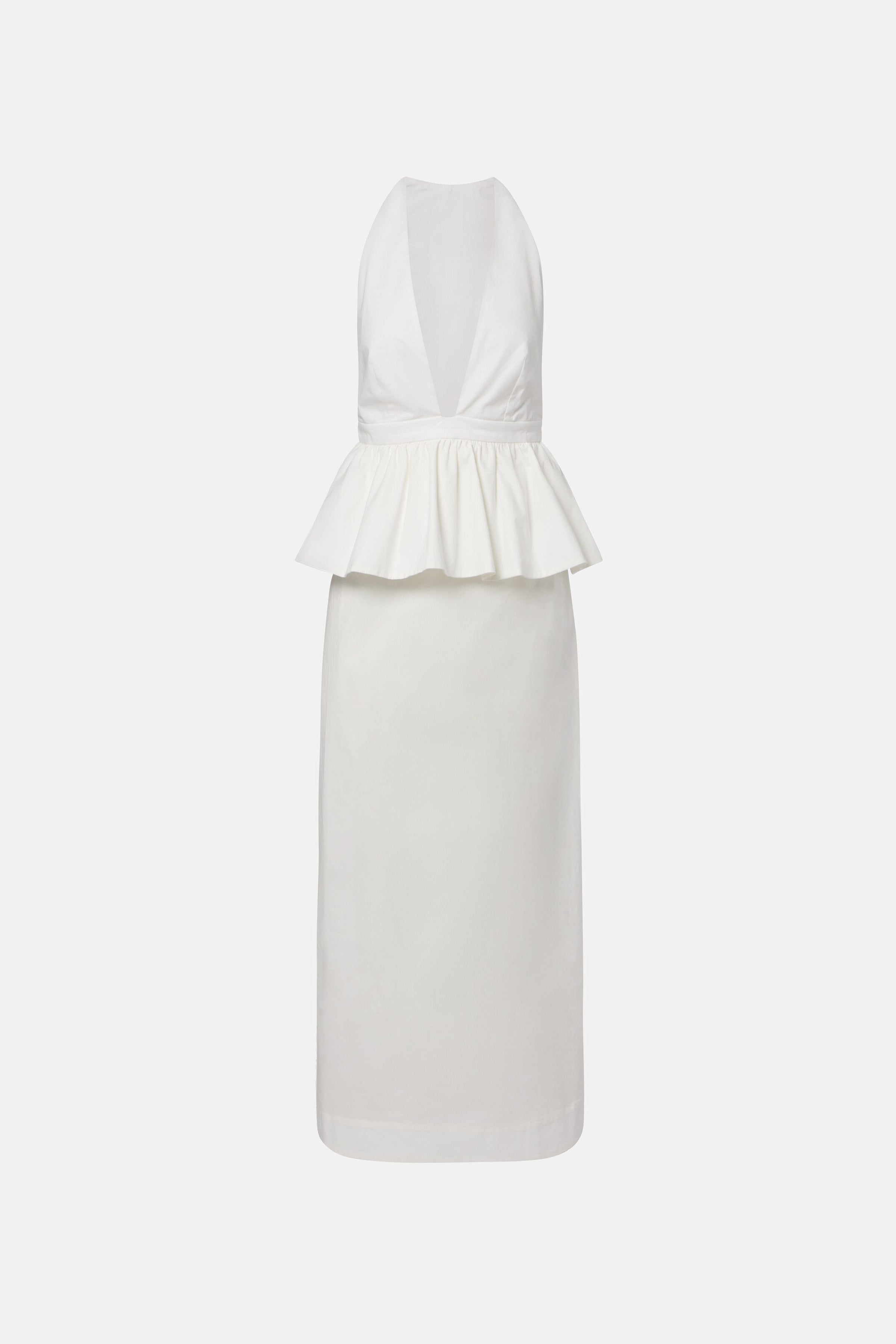 Front view of a white halter peplum dress with fitted skirt design.