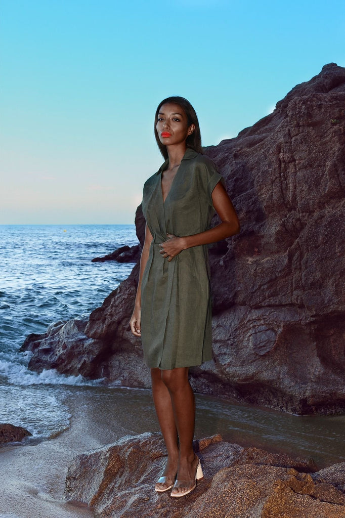 Green wrap linen formal dresses with a V-neckline and fitted waist.