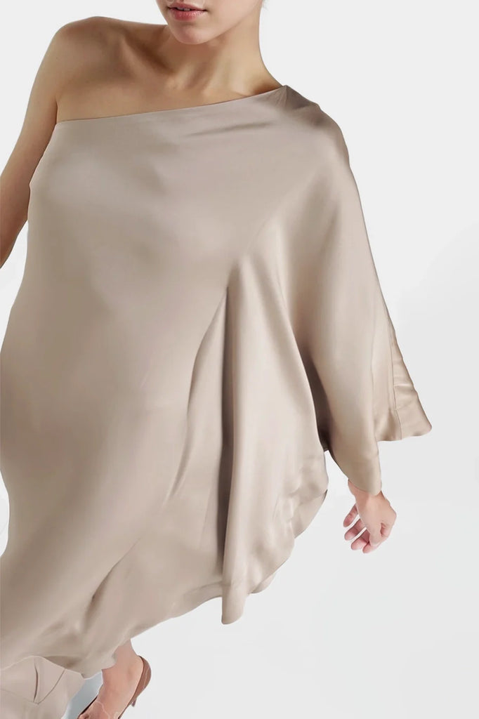 Stylish beige dresses with seam detailing and concealed side zip fastening.