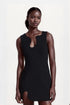 Asymmetric black mini dresses with a unique puzzle-inspired design