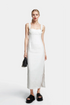 Lucy Linen Midi Dress in off-white featuring a draped bustier design for an elegant look.