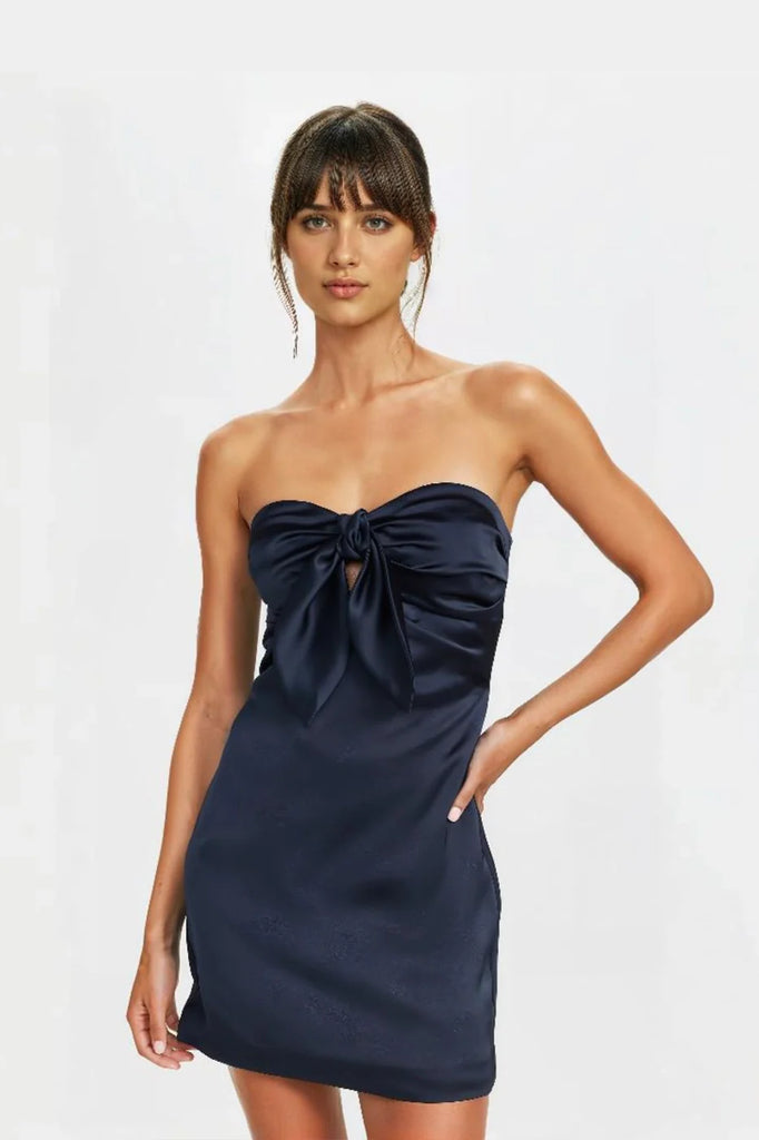 Elegant navy satin mini dresses with a flattering A-line silhouette and tie-front design.