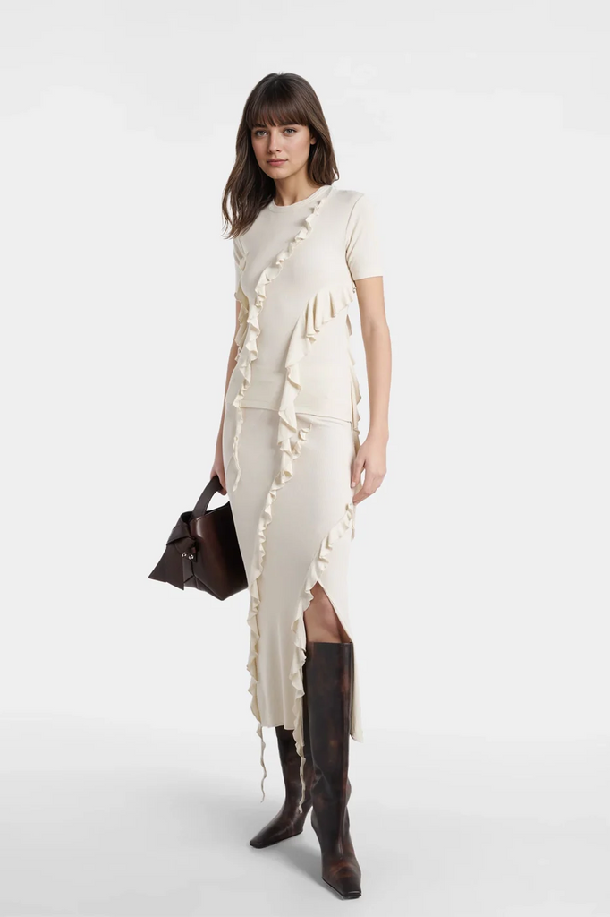 Sadie Fringed Top in off-white with asymmetrical fringe detailing.