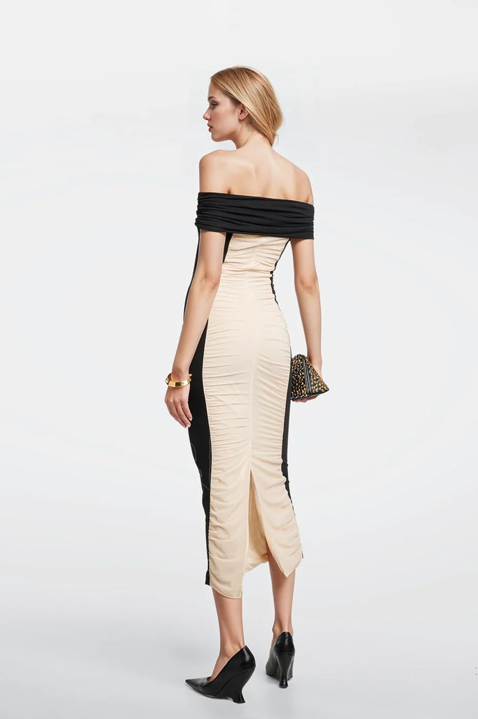 Chic black and beige dresses designed in Madrid for a flattering fit.