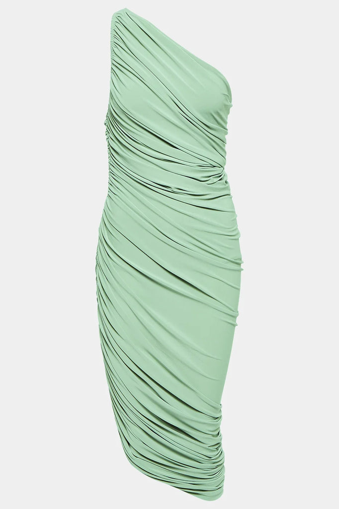 Elegant green shirred dresses with a textured, figure-flattering fit.