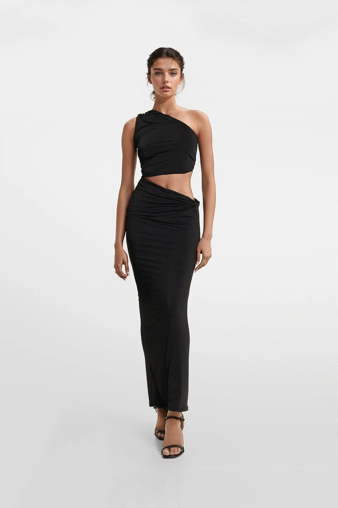 Fitted black jersey dresses featuring an asymmetric skirt and ruching.