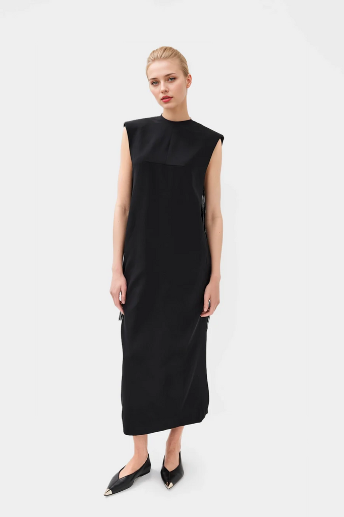 Elegant black midi dresses featuring a round neckline and on-seam hip pockets.