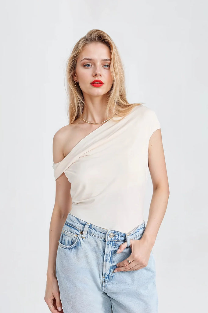 Celia one-shoulder jersey top in beige with ruching details.