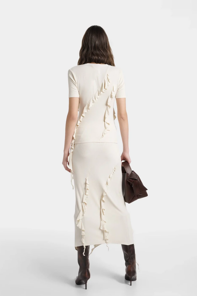 Sadie Fringed Skirt in off-white with asymmetrical fringe detailing.