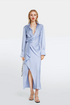 "Luna Satin Shirt Dress in sky blue with a wrap bodice and cascading pleats."