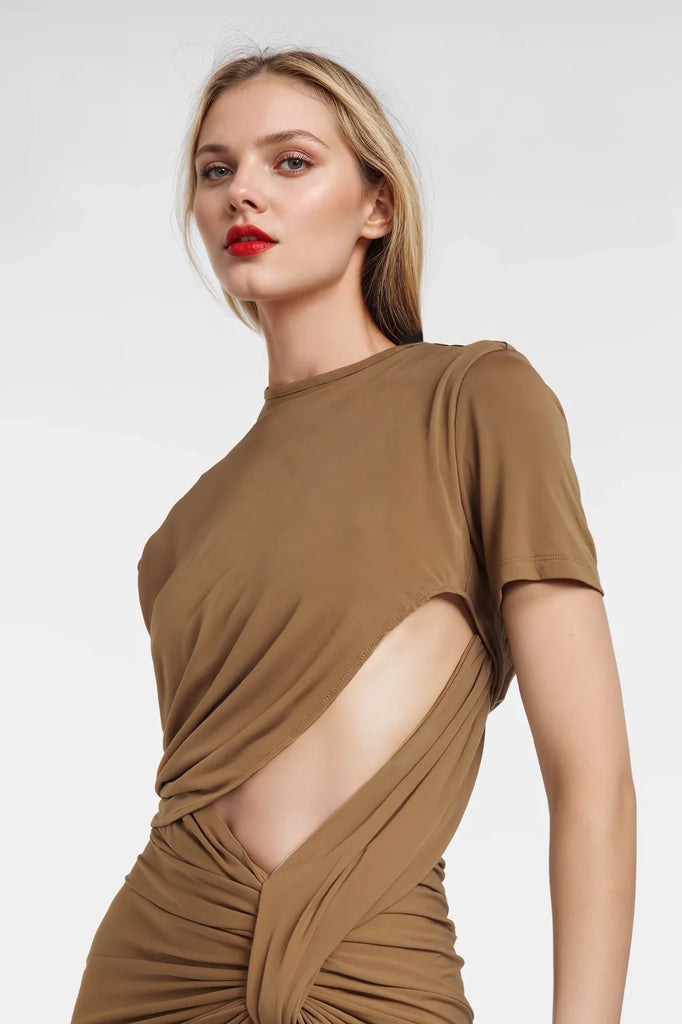 Sleek fitted dresses featuring an asymmetrical silhouette in soft jersey fabric.