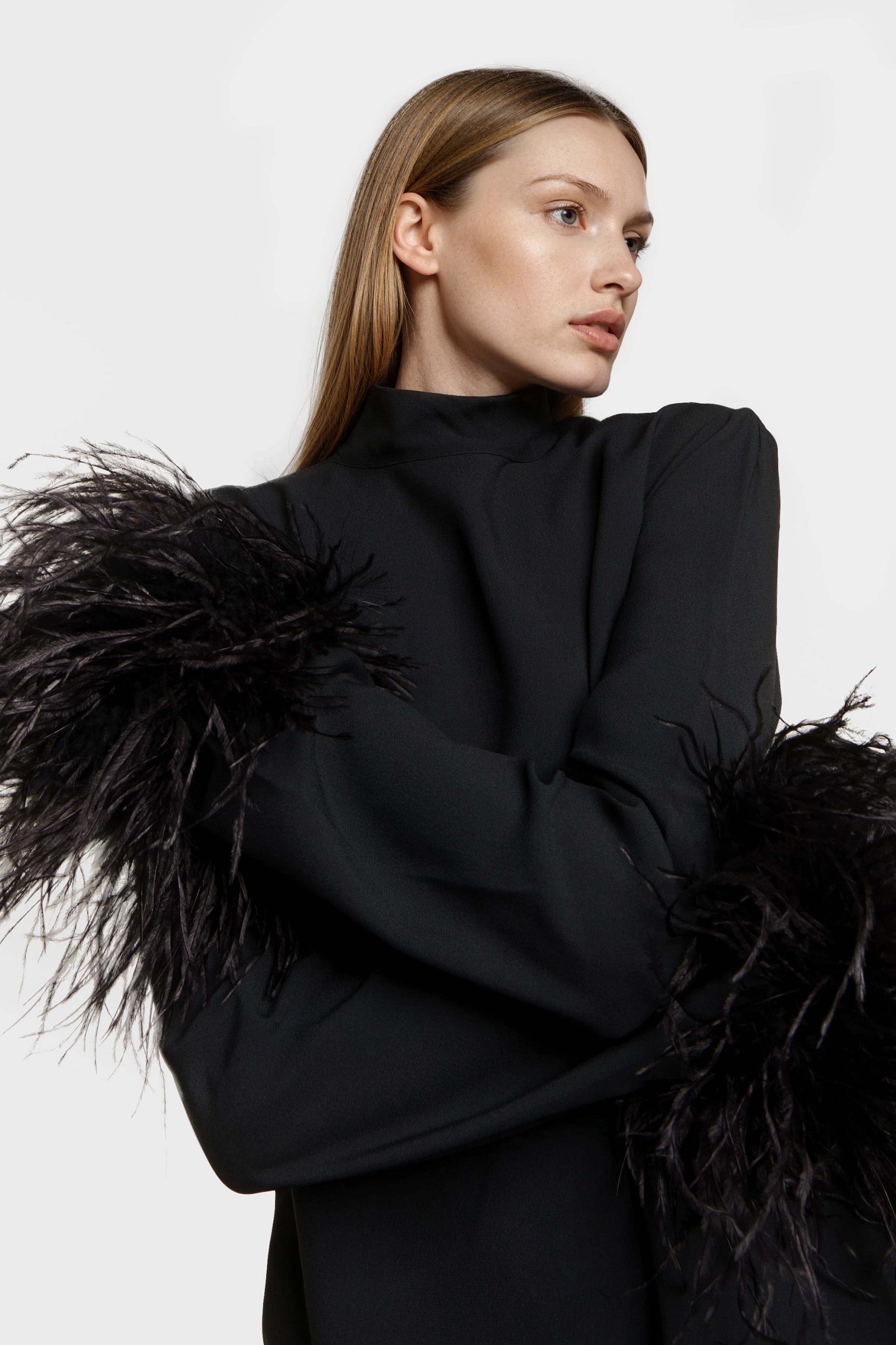 Sophia mini dresses made from light black crepe, perfect for evening wear