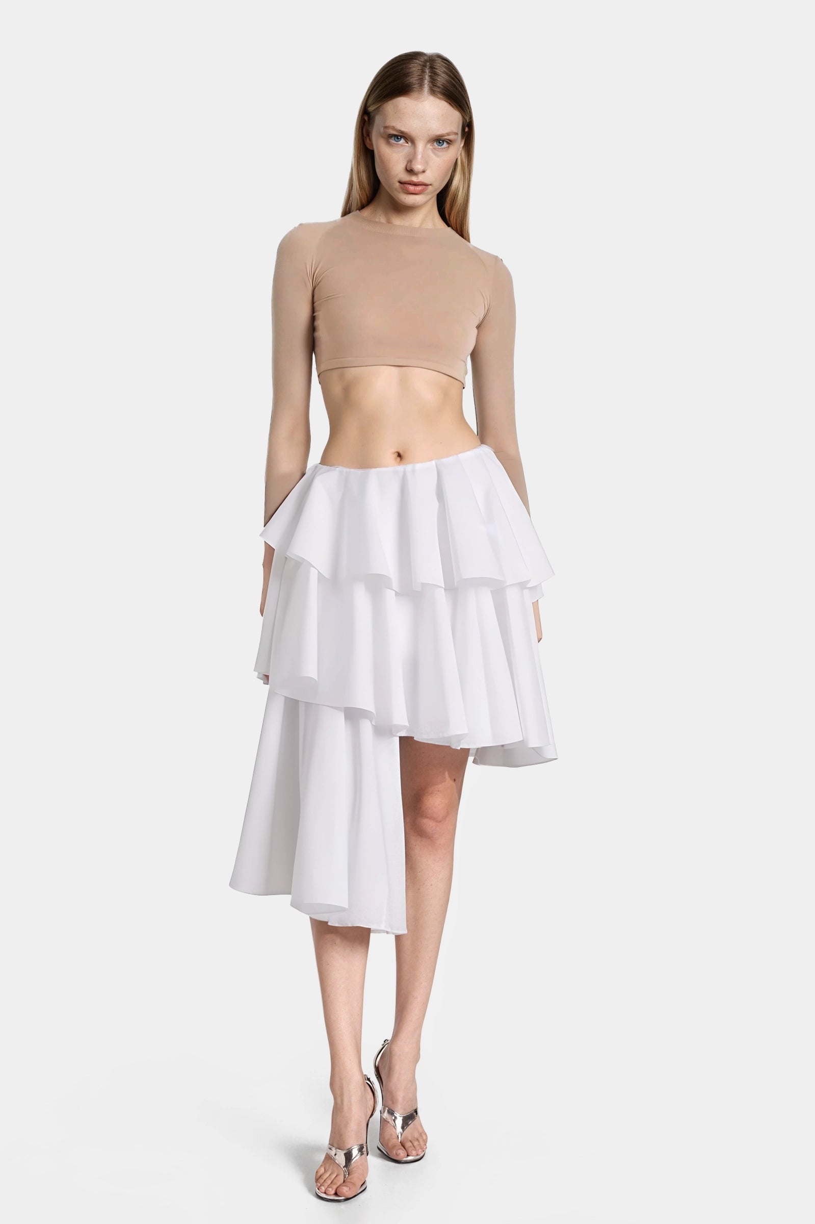Front view of white poplin midi skirt with asymmetric ruffle silhouette