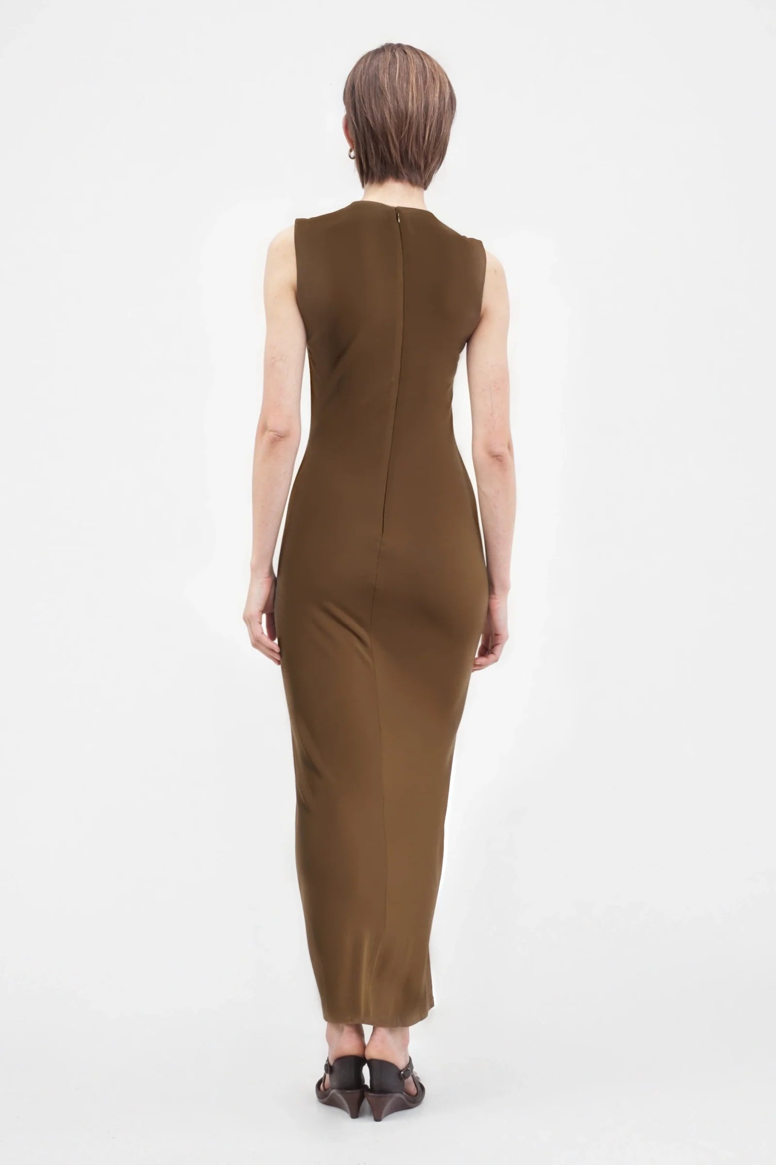 Back view of the Claudine Dress showing sleek silhouette and clean tailoring