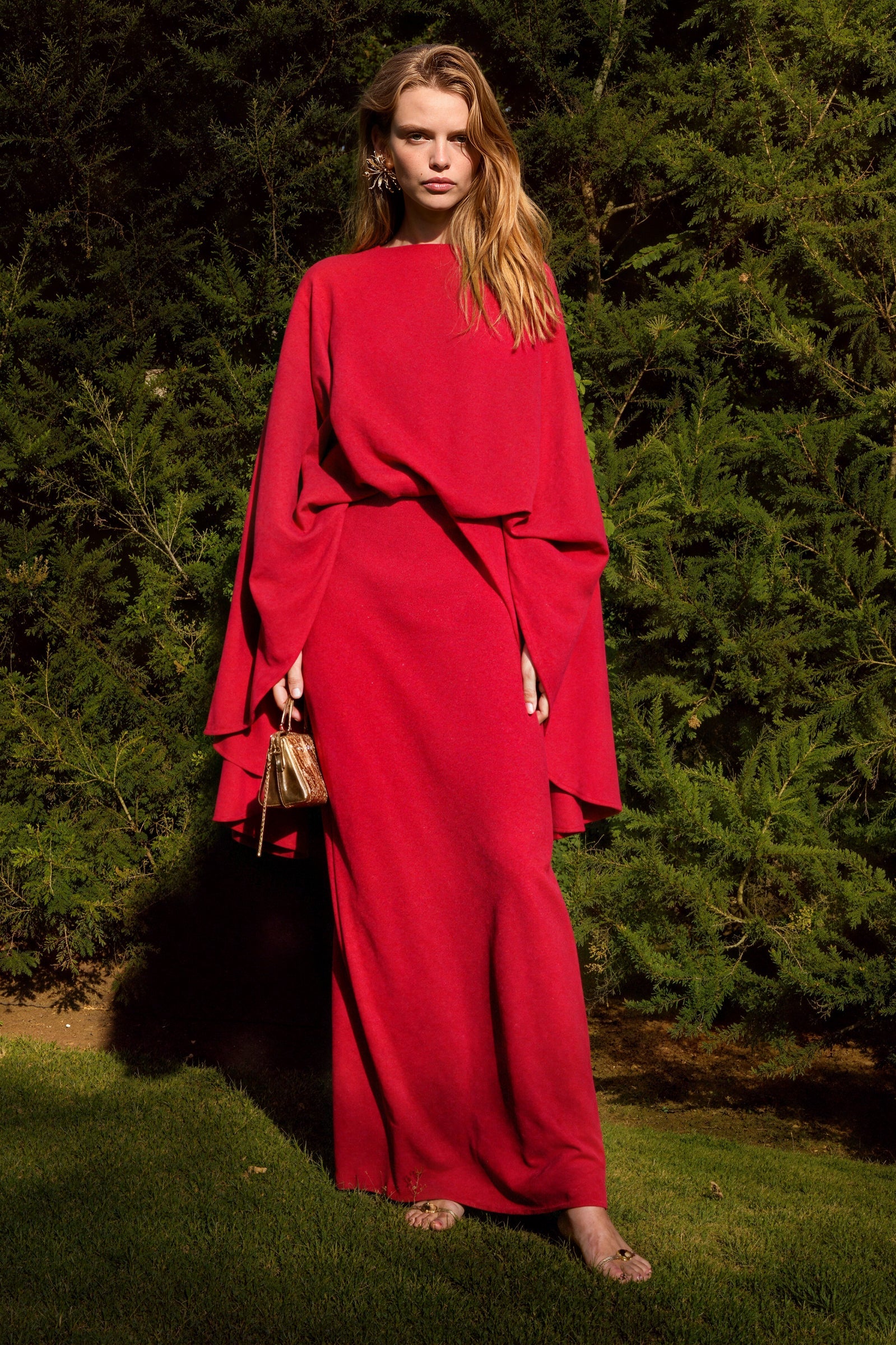 Boat neckline gown made in Madrid in luxurious crepe.