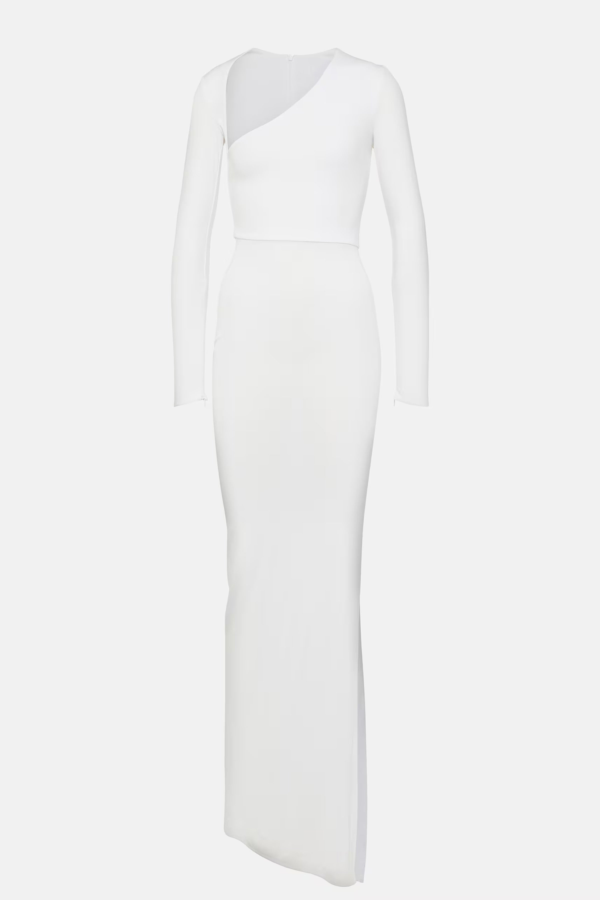 Studio product shot of a long-sleeved white asymmetric gown with a diagonal chest cut-out and floor-length skirt on a white background.