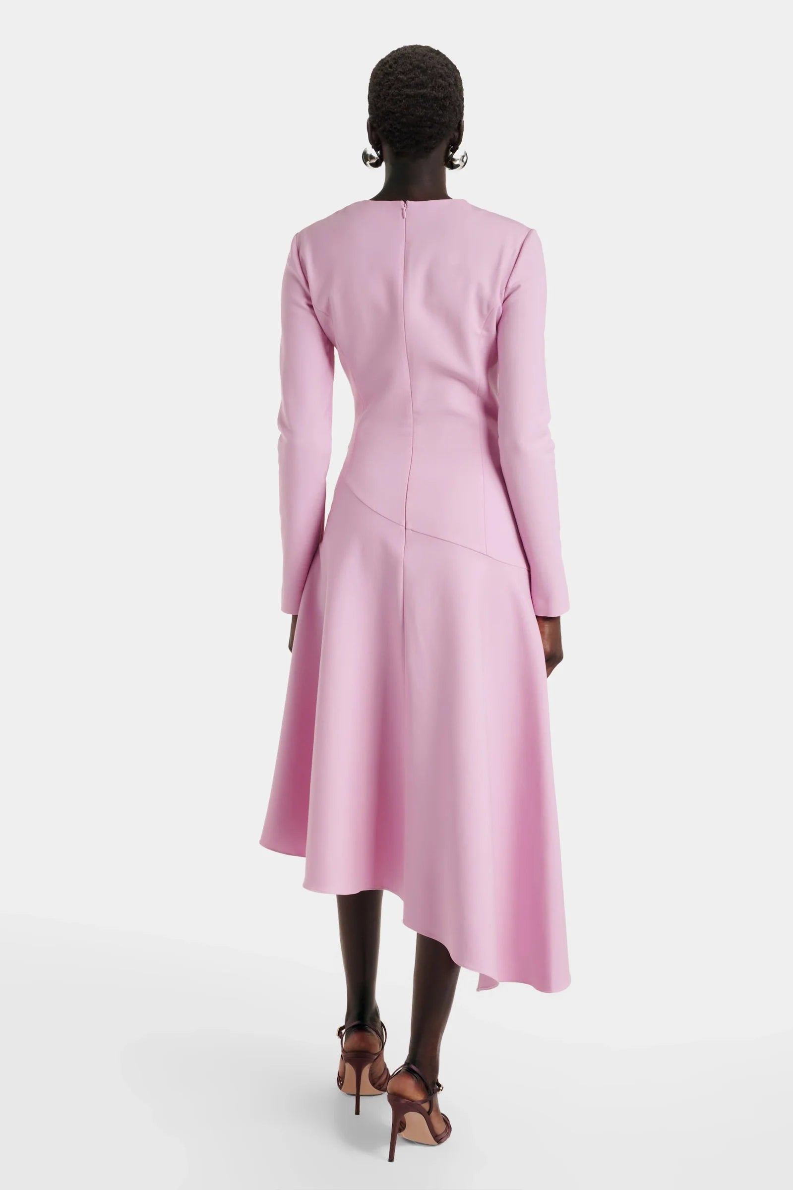Back view of Sustainable recycled crepe pink dress with long sleeves
