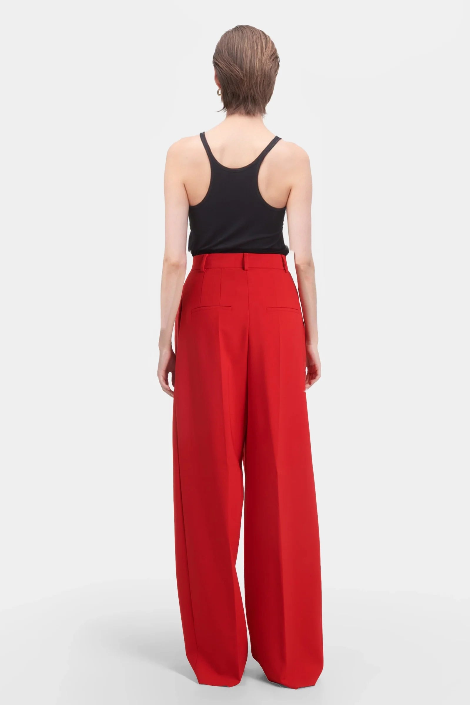 Back view of the pants paired with the matching red blazer jacket.