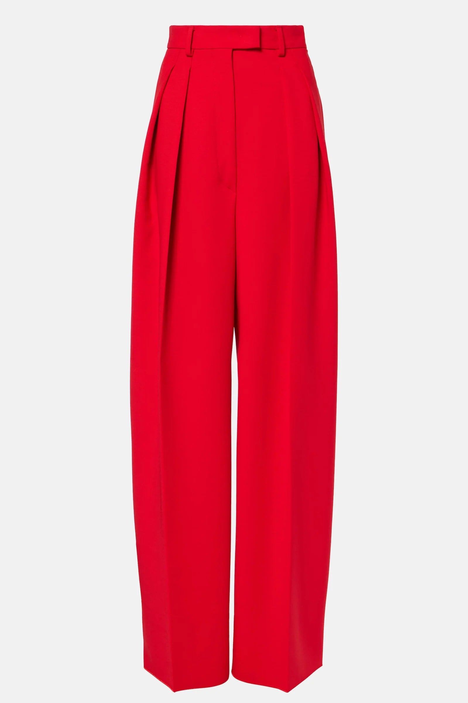 Front view of red trousers showing structured waistband and flowy silhouette.