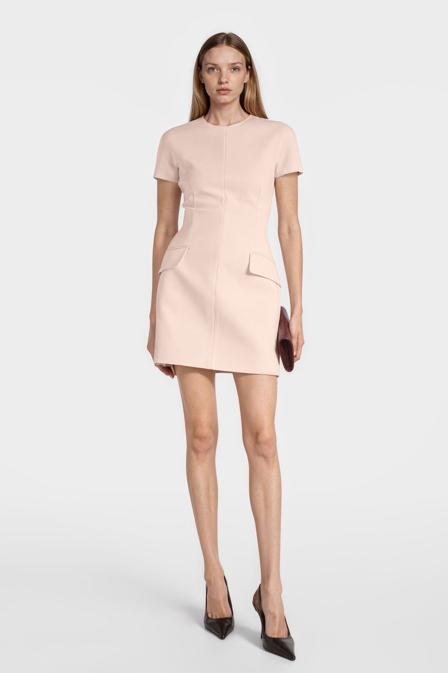 Model wearing Felipe Albernaz salmon crepe mini dress – tailored short sleeve fit
