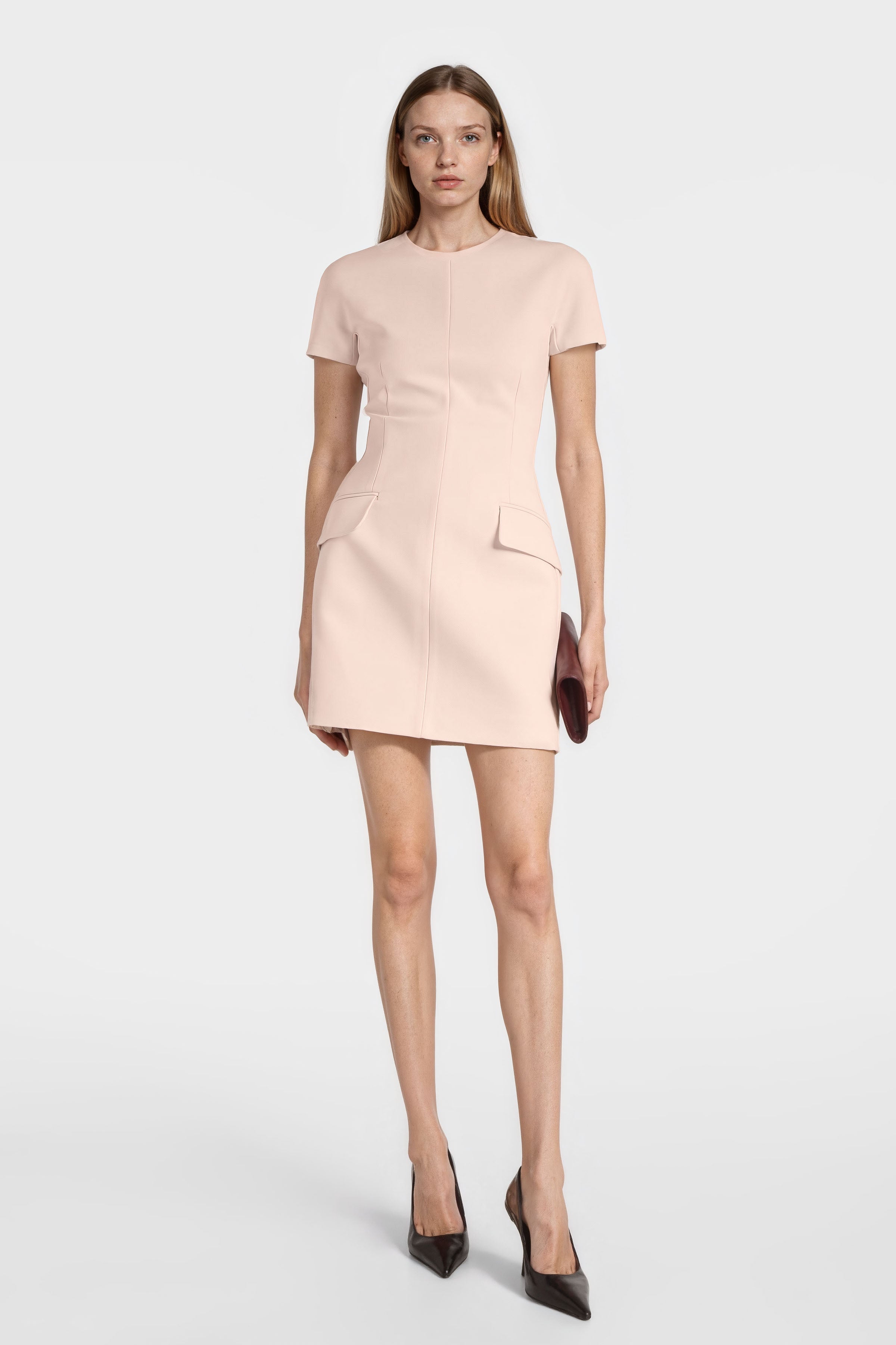 Model wearing Felipe Albernaz salmon crepe mini dress – tailored short sleeve fit